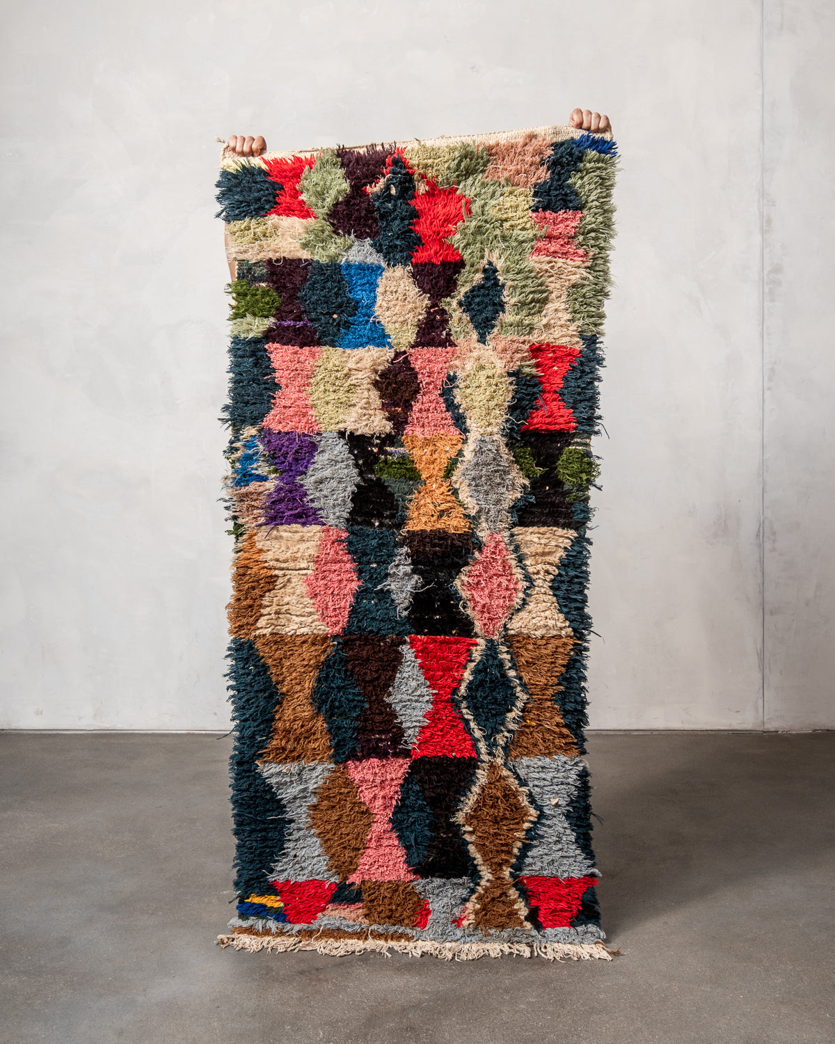 Modern designer vintage handcrafted Berber rug from Morocco. Boucherouite runner rug with beautiful colors and patterns.
